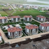 Elazığ İli Karakoçan İlçesi Gölpınar Mahallesi 126 Adet Konut ve 1 Adet 2 Dükkanlı Ticaret Merkezi, Yeni Mahallesi 174 Konut ve 1 Adet 3 Dükkanlı Ticaret Merkezi İnşaatları İle Altyapı ve Çevre Düzenlemesi İşi